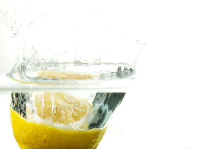 lemon and water bubbles on a white background