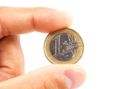 One euro coin on white with handの写真素材