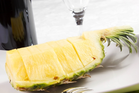pineapple slices on the dish on the tableの写真素材