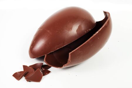 chocolate easter eggs one still wrapped in foil a western custom given to children as giftsの写真素材