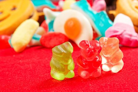 jelly bears on a red tableclothの写真素材