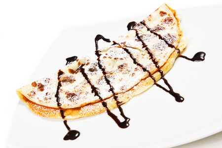 crepes with chocolate syrupの写真素材