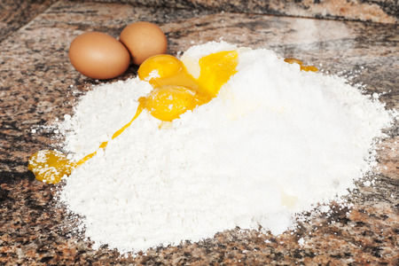 ingredients for pie dough, egg, flourの写真素材