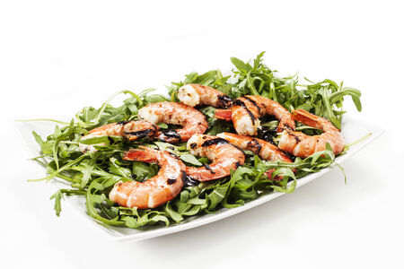 prawns with rocket on a white backgroundの写真素材