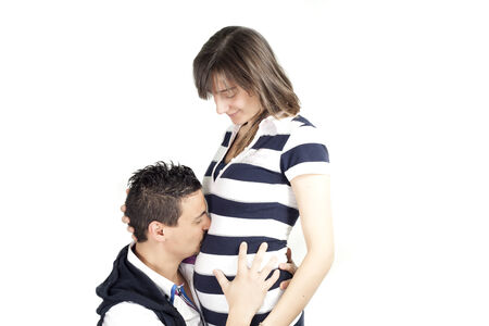Guy Who Kisses The Belly Of A Pregnant Girlの写真素材