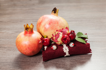 decorate soap and pomegranate on the wood tableの写真素材