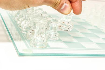 transparent glass chess isolated on white