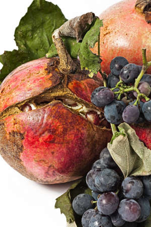 Still life on white background, (pomegranate and grape)の写真素材