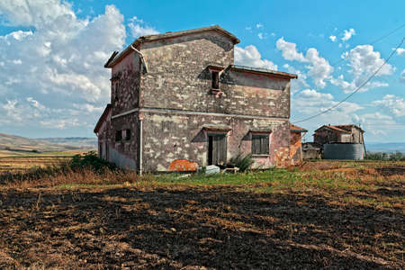 old abandoned house on land burnedの写真素材