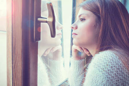 reflection of girl at the window
