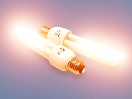 concept economy-Low-energy light bulb on ultra lightの写真素材