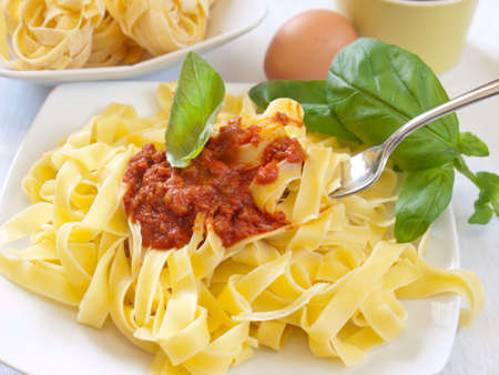 homemamde pasta noodles with bolognese sauceの写真素材