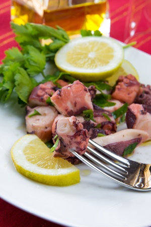 octopus salad with olive oil,lemon and parsleyの写真素材