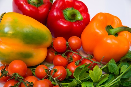 fresh vegetables with peppers, tomatoes and parsleyの写真素材