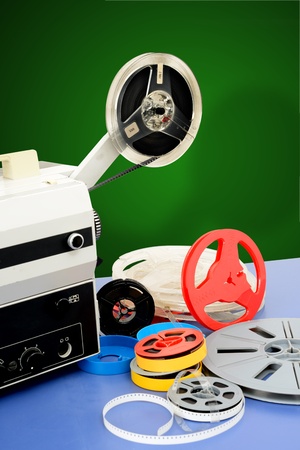old vintage film projector on background screenの写真素材
