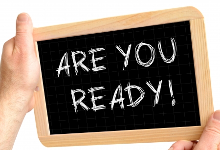 blackboard in the hands concept of business challengeの写真素材