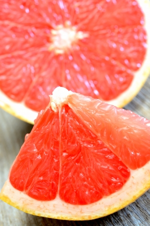 various fresh colored  fruit on wooden tableの写真素材