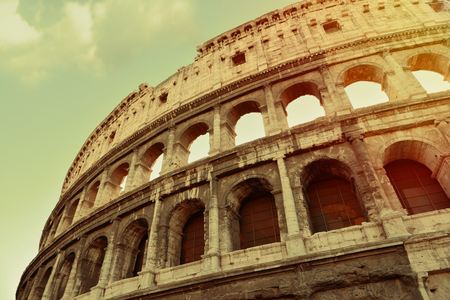 aged photo  of the famous coliseum in romeの写真素材