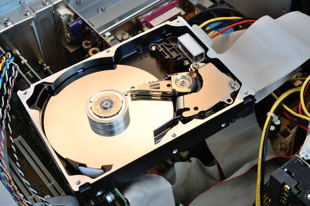 hard disc opened under working with light reflection