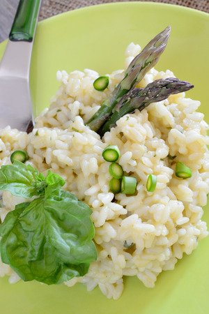 risotto with asparagus decorated with asparagus tipsの写真素材