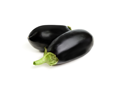 fresh raw eggplants on white backgroundの写真素材