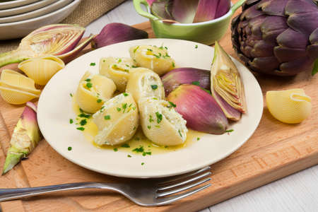 slugs traditional pasta filled with artichoke cream cheese, butter and pepperの写真素材