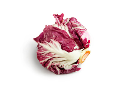 fresh red radicchio isolated on white backgroundの写真素材