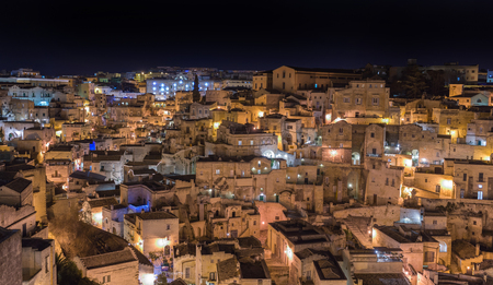 nightview  of Sassi. Matera is the Italian city designated European Capital of Culture in 2019 and World Heritage Site and set for many films such as "The Passion of the Christ" by Mel Gibson on 2002.の写真素材