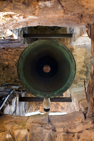 seen from below the bell tower and the bellの写真素材