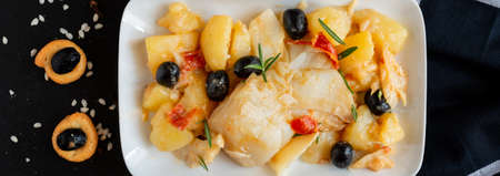 top view of Baked Codfish baccala Recipe with Potatoes and Olivesの写真素材