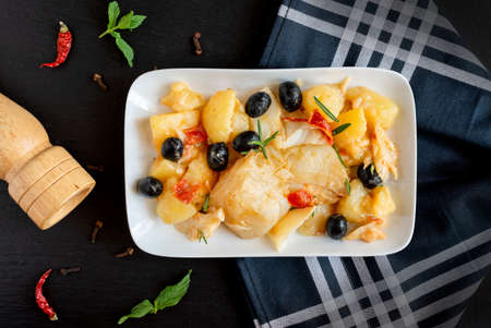 top view of Baked Codfish baccala Recipe with Potatoes and Olivesの写真素材