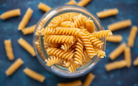 Typical wholemeal fusilli pasta with background out of focus