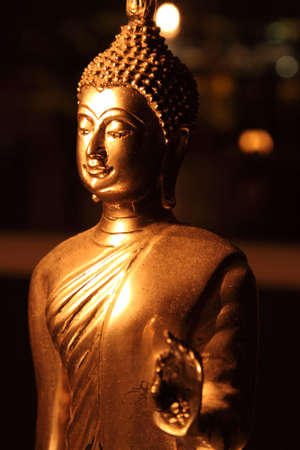 Buddha in Candlelightの写真素材