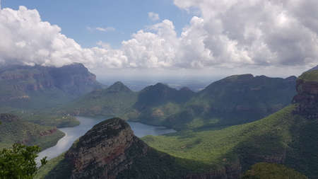A panoramic view of River Canyon with some clouds on a sunny day.の写真素材