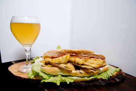 street food sandwich stuffed with various toppingsの写真素材