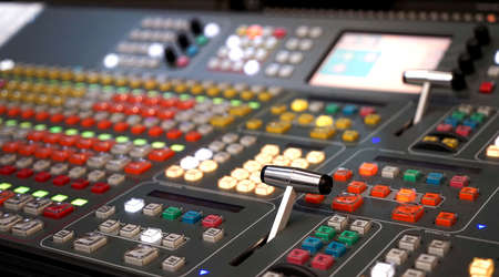 Professional audio mixing console with faders and adjusting knobs,TV equipment Black and White selective focusの写真素材