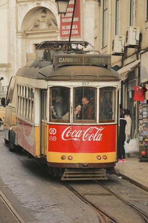 Lisbon-Portugal, December 25, 2015 : An old tradition tram carriage in the city center of Lisbon, Portugal. The city kept old tradition tram in service within the historical part of the capitalの素材