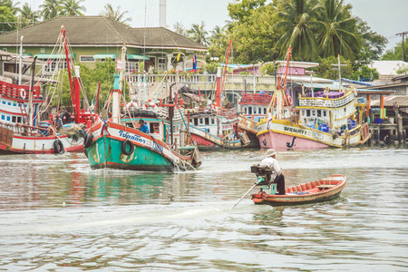 PRACHUAP KHIRI KHAN , THAILAND - August 17, 2016 Colorful fishing boats at pier in Thailandのeditorial素材