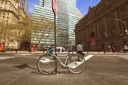 NEW YORK, USA - APRIL 15, 2016 : Selective focus on bicycle parked near the National Museum of the...