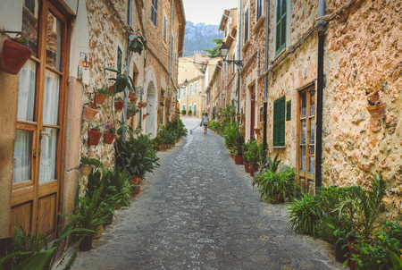 Valldemossa typical village with plants pots in facades at Mallorca island, Spainの写真素材
