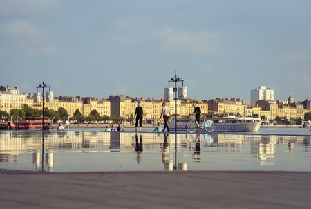 FRANCE, BORDEAUX - SEPTEMBER 3, 2016 : Reflection of Bordeaux city at Bordeaux water mirror in summerのeditorial素材