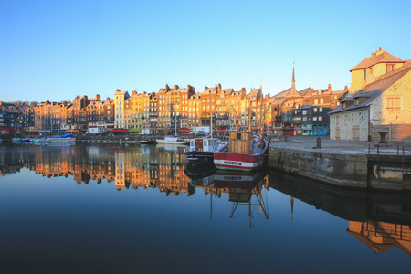 Honfleur, France - December 30, 2016 : Morning light on building at Honfleur port is a truly picturesque and one of charming harbour in Franceのeditorial素材