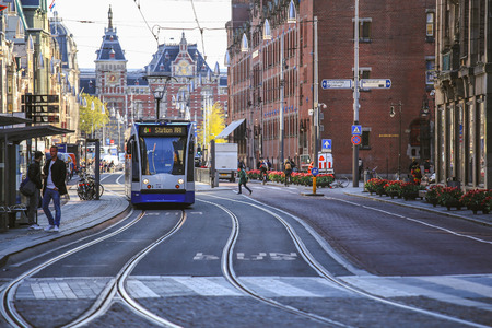 Amsterdam-Netherlands, April 18, 2017 : Modern tram in Amsterdam, tram is one of the quickest ways to get into and around the city centreのeditorial素材