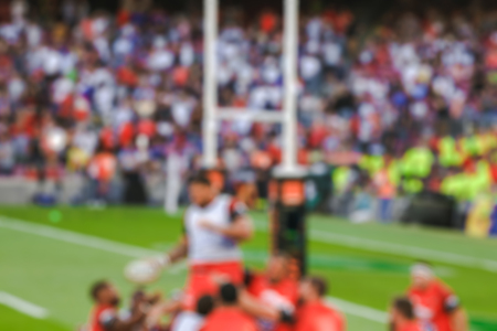 Blurred background of rugby players fighting, Outdoor sportの写真素材