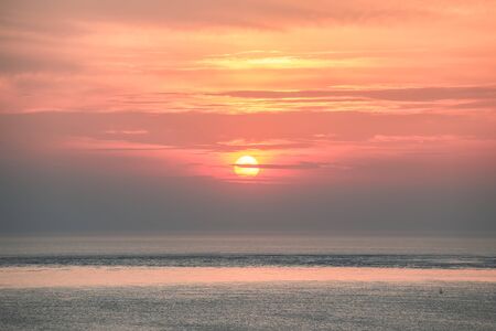Selective focus on sun during sunrise or sunset, nature backgroundの写真素材