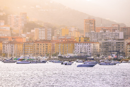 Ajaccio France - November 8, 2017 : France Corsica Ajaccio Old Harbour with colourful facades of the historical centre and mountain layersのeditorial素材