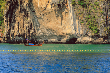 Long boat on Andaman sea, Poda island in Thailandの写真素材