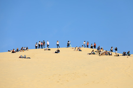 LA TESTE-DE-BUCH, FRANCE -APRIL 6, 2018 : people visiting the famous highest sand dune in Europe Dune of Pylaのeditorial素材