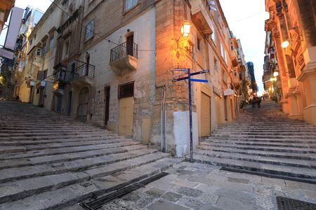 Traditional houses and stair in Valletta the capital city of Maltaの写真素材