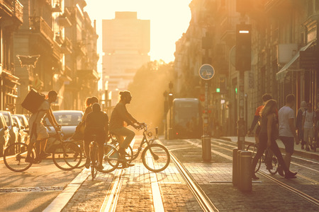 Street photography, people crossing the road during the sunset in Bordeaux city, France. Vintage styleのeditorial素材